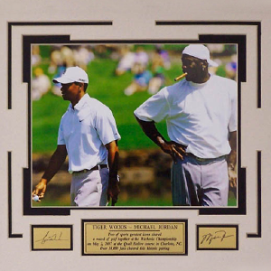 Framed photo of Michael Jordan and Tiger Woods golfing